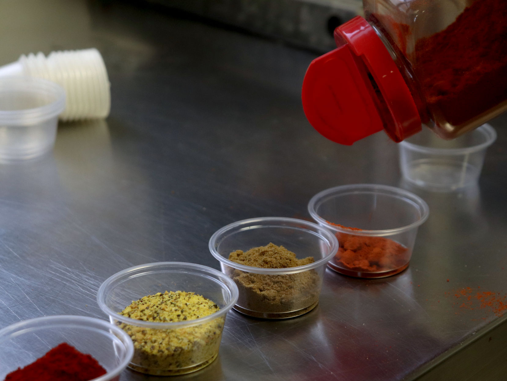 Colin Enslin mixes seasonings